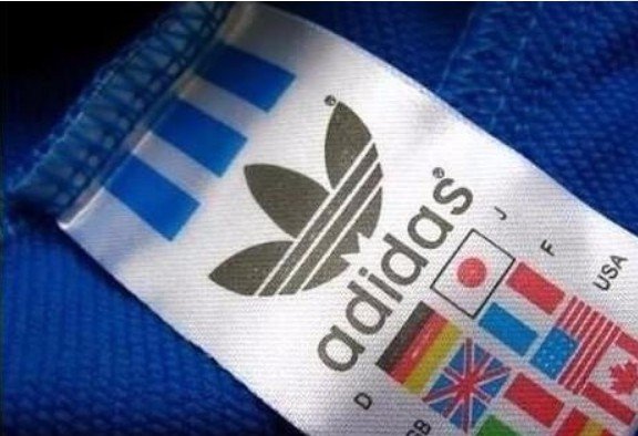 如何鉴别三叶草外套真假（有图的）