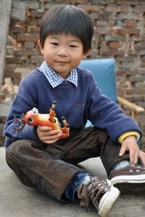 《俺娘田小草》里面幼年时期的李小浩是谁扮演的？