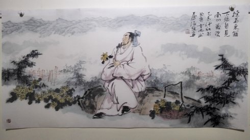 采菊东蓠下，悠然见南山这句话什么意思