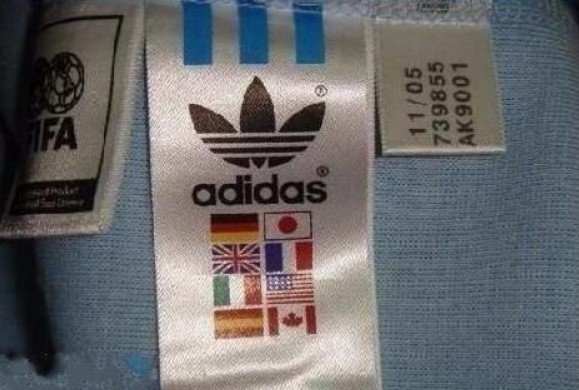 如何鉴别三叶草外套真假（有图的）